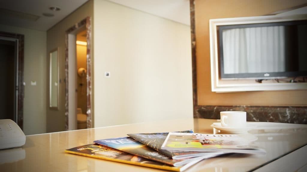 executive twin room | living area | 43-inch lcd tv with cable channels, tv