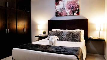 Departamento Deluxe, 1 cama Queen size | 1 habitación y ropa de cama de alta calidad