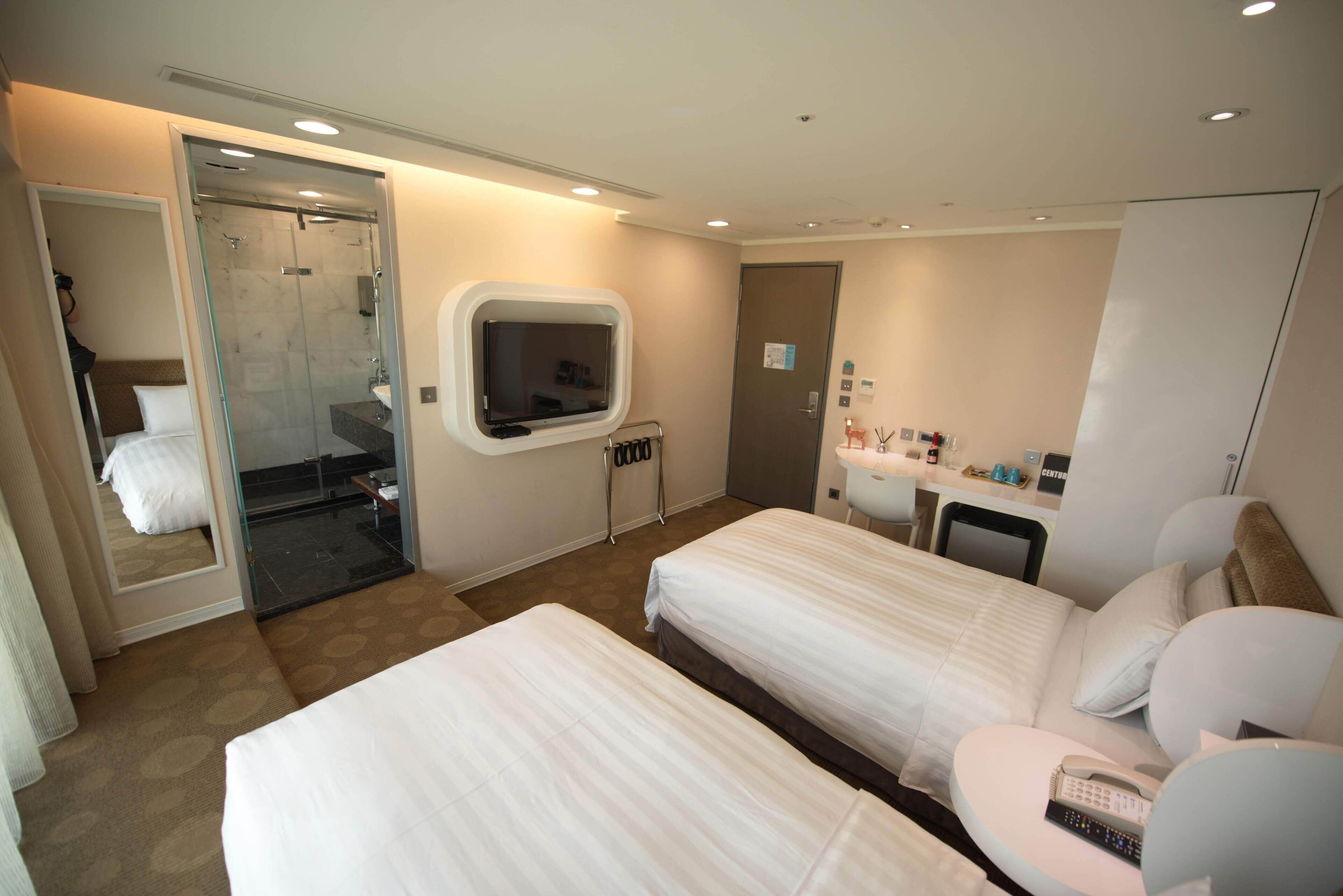 economy twin bed room - do not provide cleaning service, towels, any one  time use amenities  | down duvets, in-room safe, desk, blackout curtains