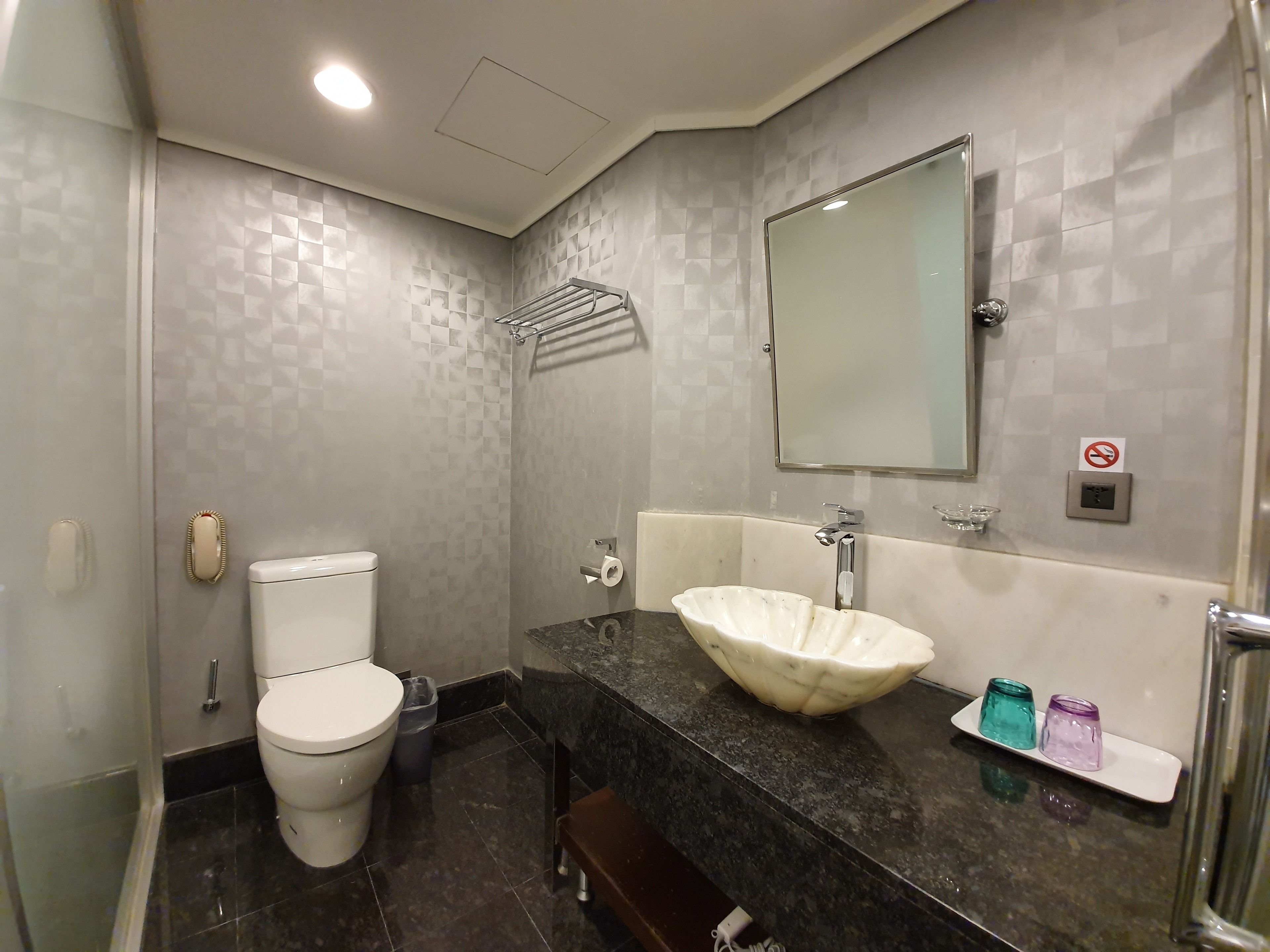 shower, rainfall showerhead, hair dryer, towels