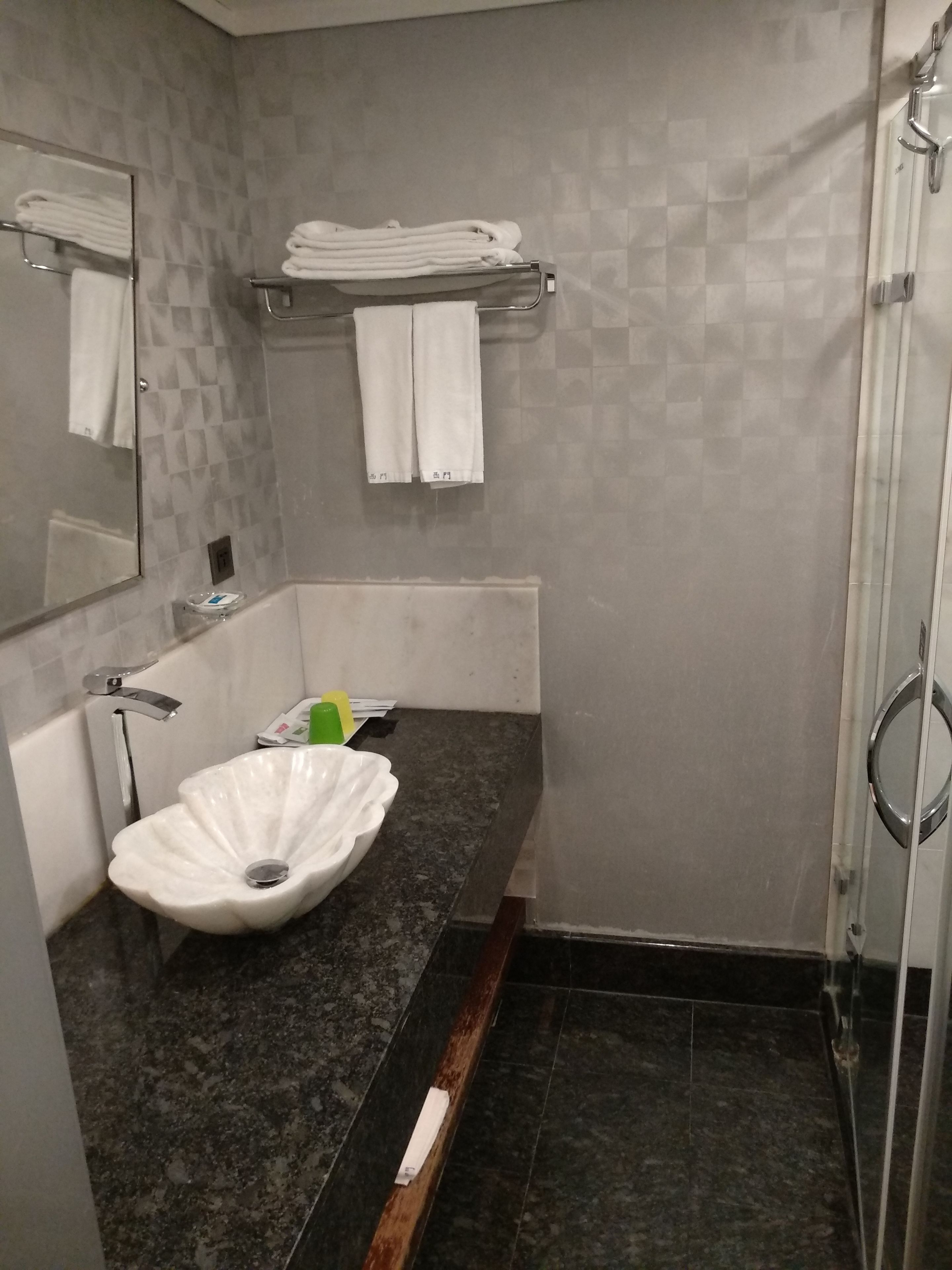 shower, rainfall showerhead, hair dryer, towels