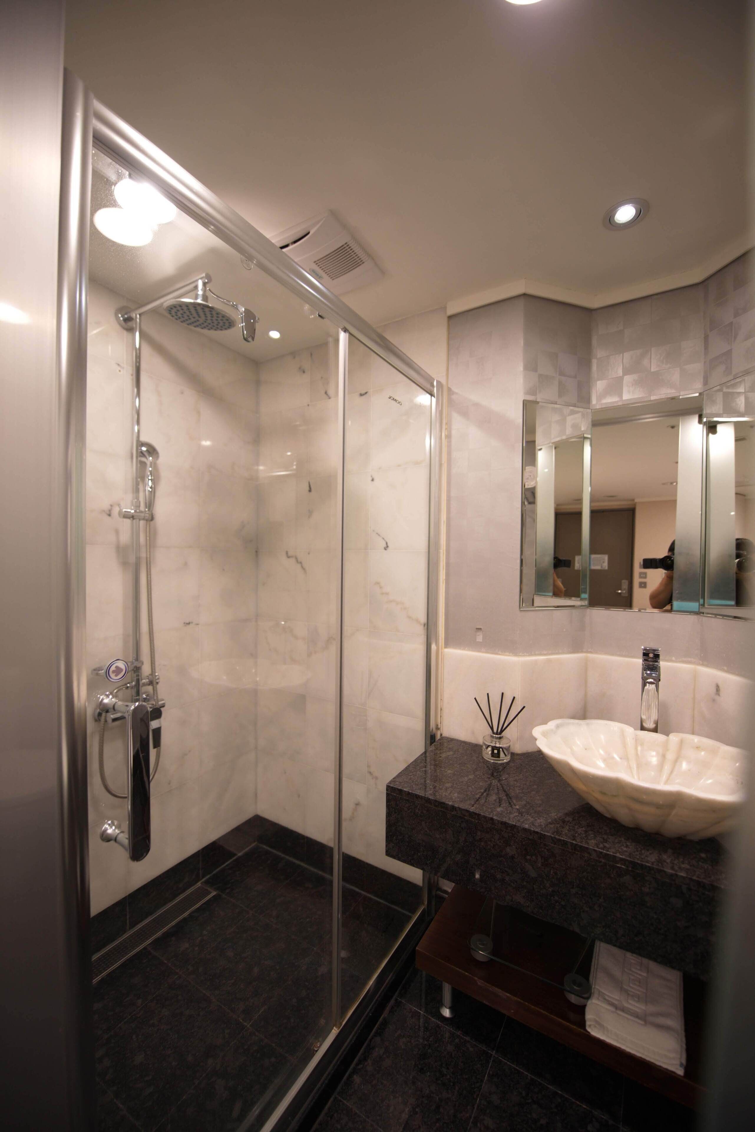 shower, rainfall showerhead, hair dryer, towels