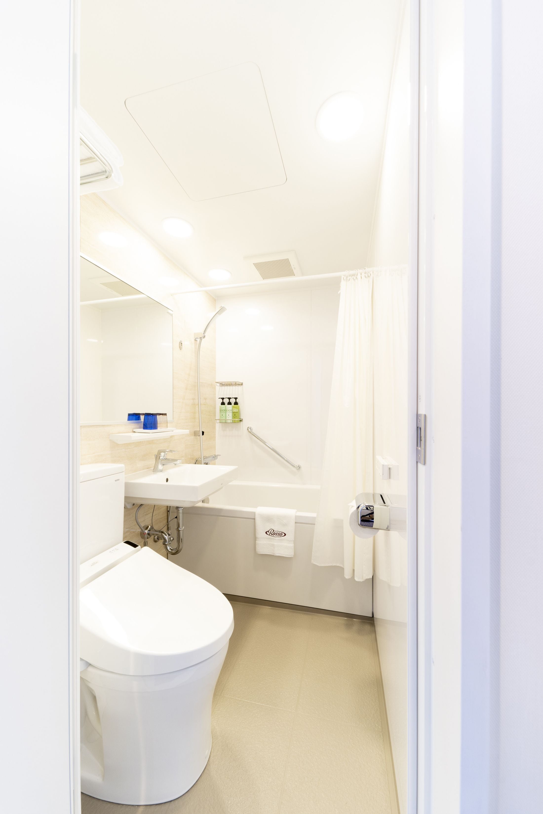 free toiletries, hair dryer, slippers, electronic bidet