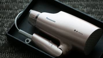 A Panasonic hair dryer in a black box.
