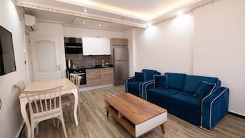 Suíte, 1 quarto | Escrivaninha, quartos à prova de som, Wi-Fi de cortesia