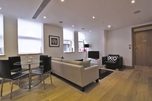 Apartment, 1 Bedroom | Living area | Flat-screen TV - Red Lion Court by Servprop (London)