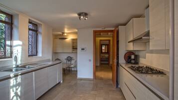 Luxury Villa, Pool View (3 Suites Luxe) | Private kitchen | Fridge, microwave, oven, stovetop