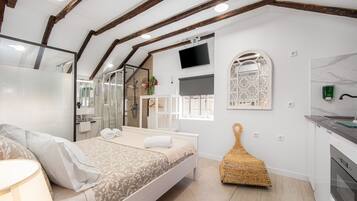 Honeymoon Studio Suite, 1 Queen Bed, Pool Access, Beachside | 5 bedrooms, individually decorated, desk, free WiFi