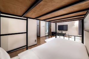 Family Room | Premium bedding, desk, blackout drapes, iron/ironing board