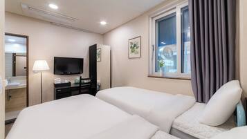 Twin Room | Premium bedding, desk, blackout curtains, iron/ironing board