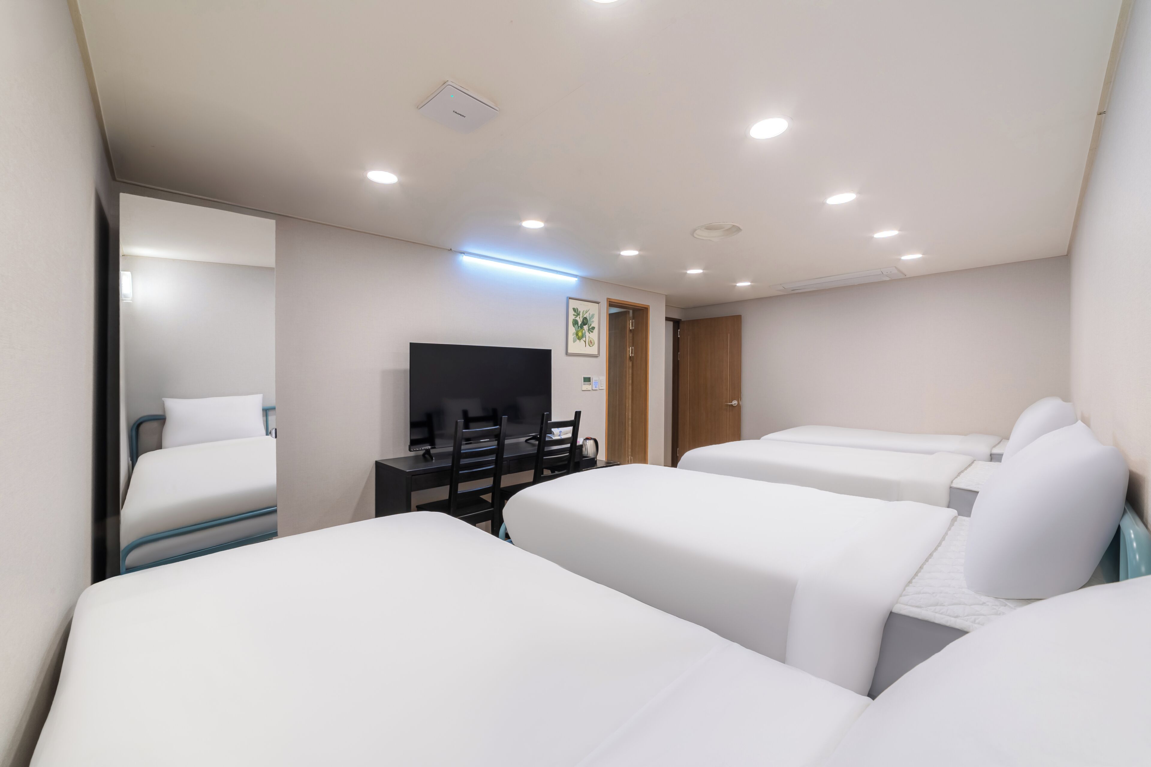 Basement Studio | Premium bedding, desk, blackout curtains, iron/ironing board