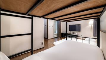 Family Room | Premium bedding, desk, blackout drapes, iron/ironing board