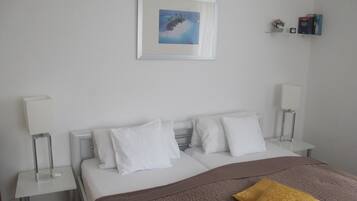 Literie hypoallergénique, couette en duvet d'oie, minibar