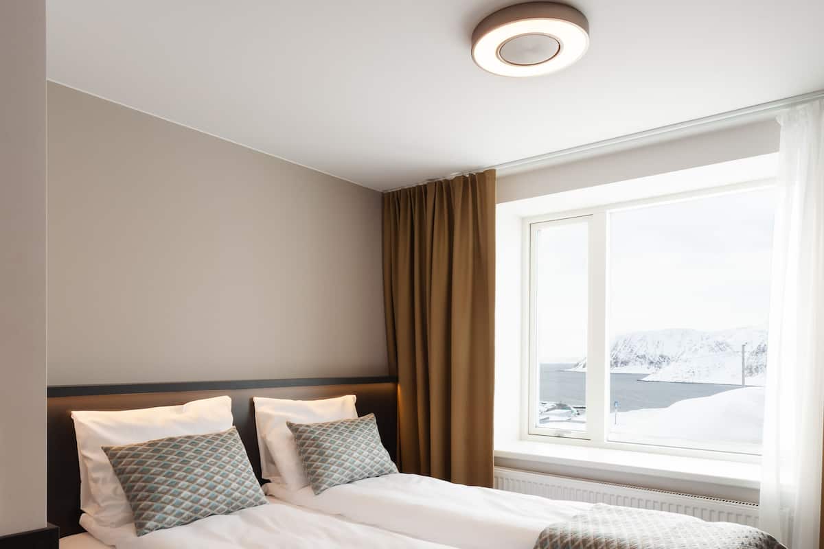 Double Room, Ocean View | 1 bedroom, blackout curtains, soundproofing, iron/ironing board