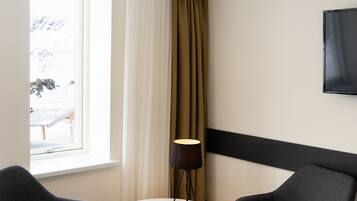 Junior Suite, Ocean View | Blackout drapes, soundproofing, iron/ironing board, free WiFi