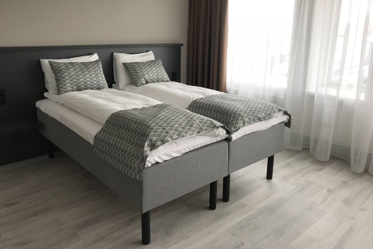Blackout curtains, soundproofing, iron/ironing board (on request)