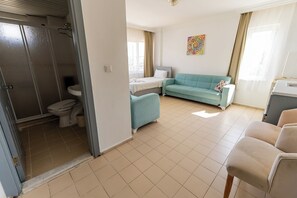 Apartament clàssic | Llençols de cotó egipci, roba de llit d'alta qualitat i minibar 