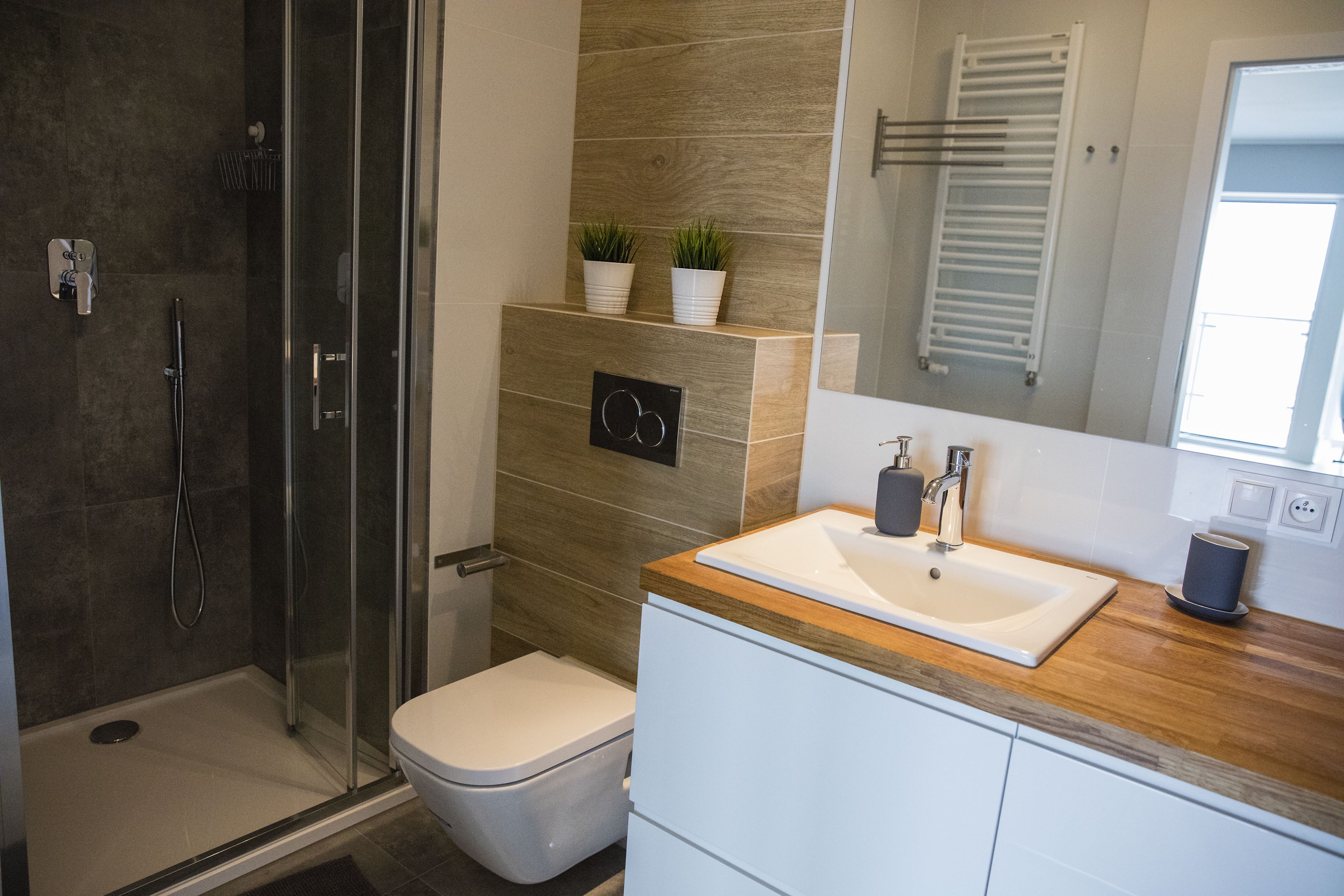 studio suite | bathroom | rainfall showerhead, free toiletries, hair dryer, towels