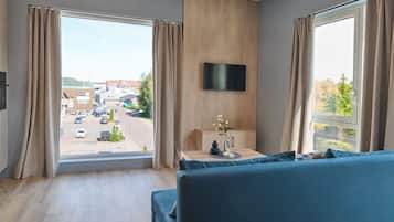 Deluxe Quadruple Room | 1 bedroom, desk, laptop workspace, soundproofing
