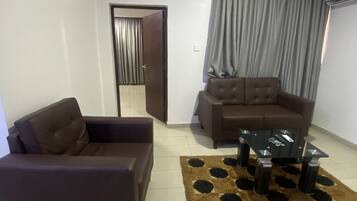 Suite presidencial | Área de sala de estar | Televisión de pantalla plana