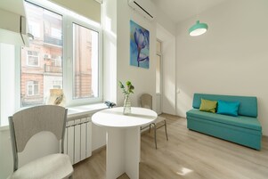 Apartment, Non Smoking, Balcony | Living area | Flat-screen TV