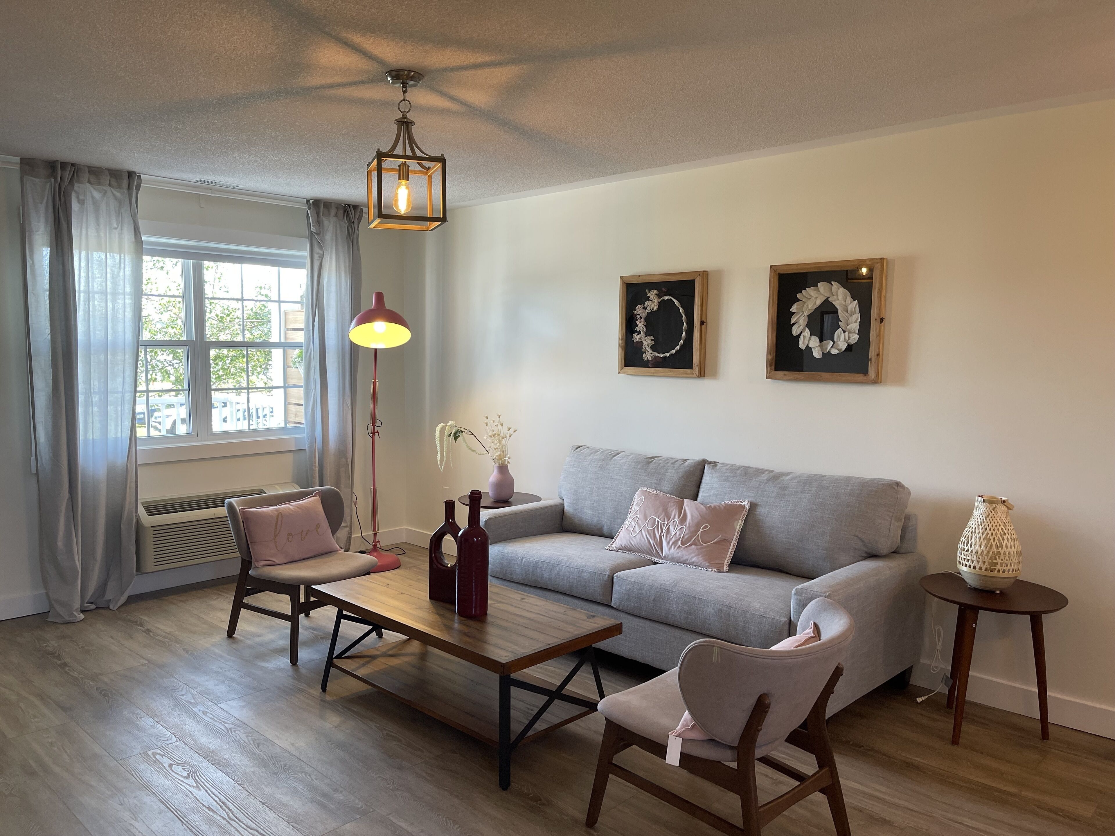 romantic suite, 2 bedrooms, kitchen, bay view (master) | living area | smart tv