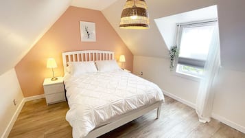 Suite Design | Lit avec matelas Select Comfort, minibar, décor unique