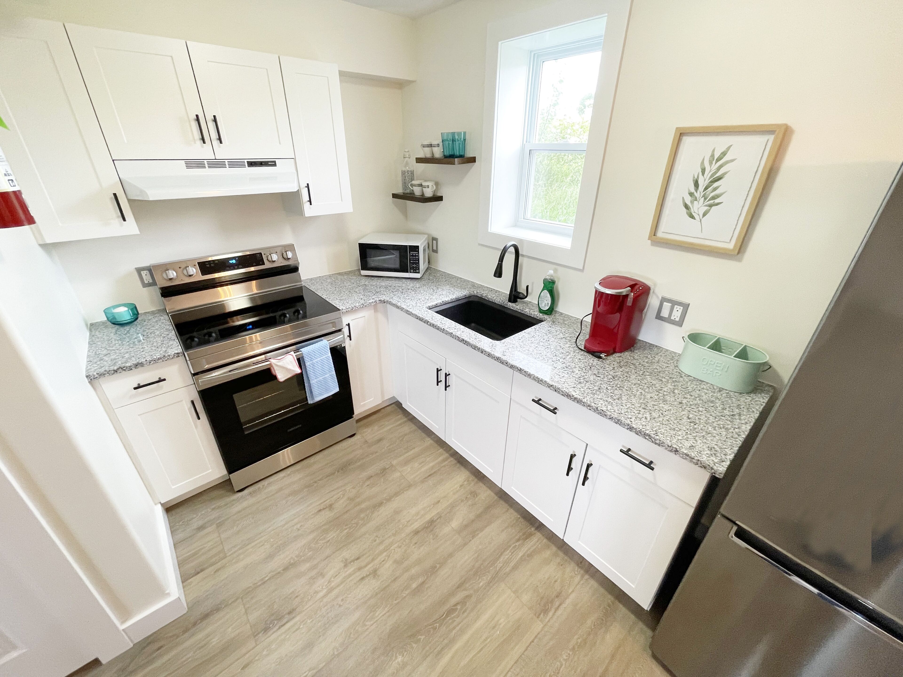 design suite, 2 bedrooms, kitchen, bay view | private kitchen | full-sized fridge, coffee/tea maker, electric kettle, coffee grinder