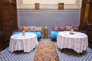 Breakfast, lunch, dinner served; local cuisine