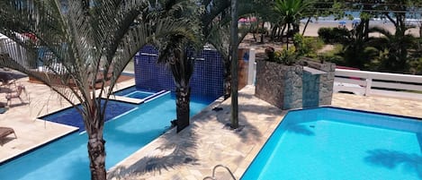 2 outdoor pools, open 9:00 AM to 8 PM, pool umbrellas, sun loungers