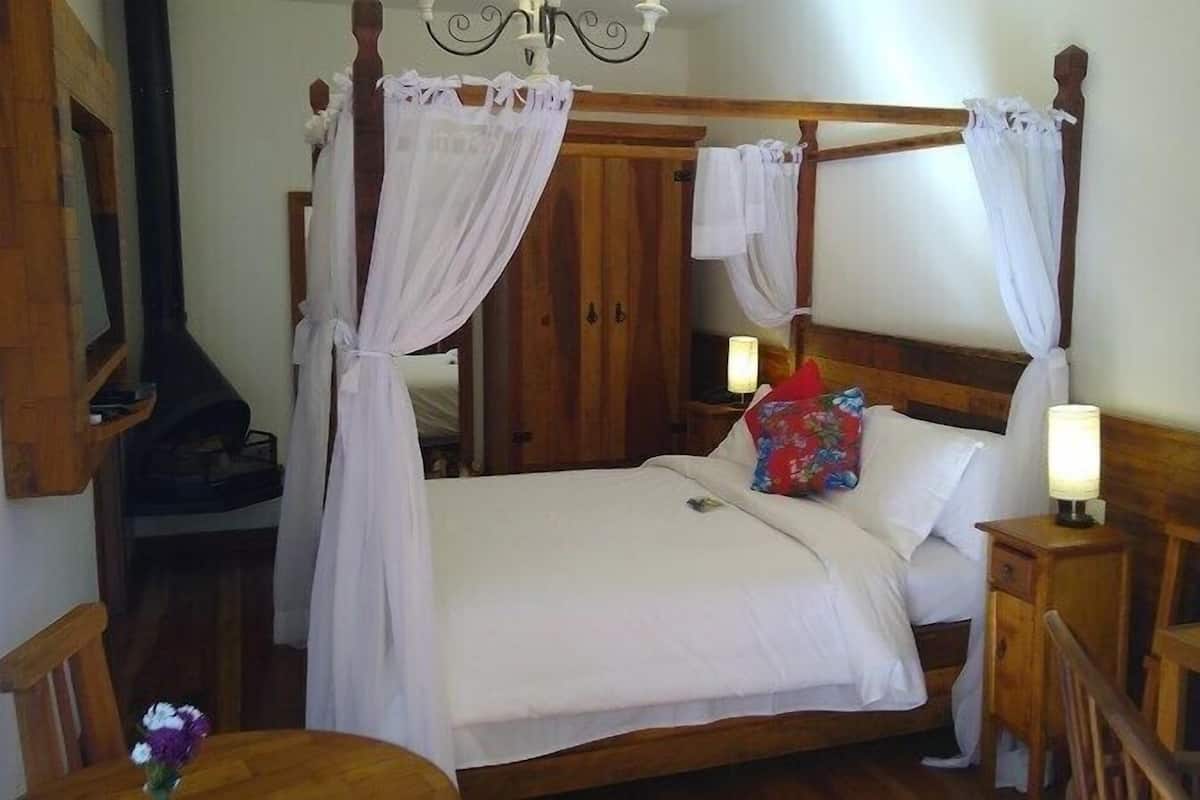 Honeymoon Room, Hot Tub, Pool View | Premium bedding, minibar, in-room safe, individually decorated