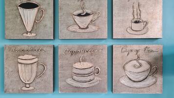 Six coffee-themed wall art pieces with names like Mocha, Caffe, Espresso, Chocolate, Cappuccino, and Cup of Tea.