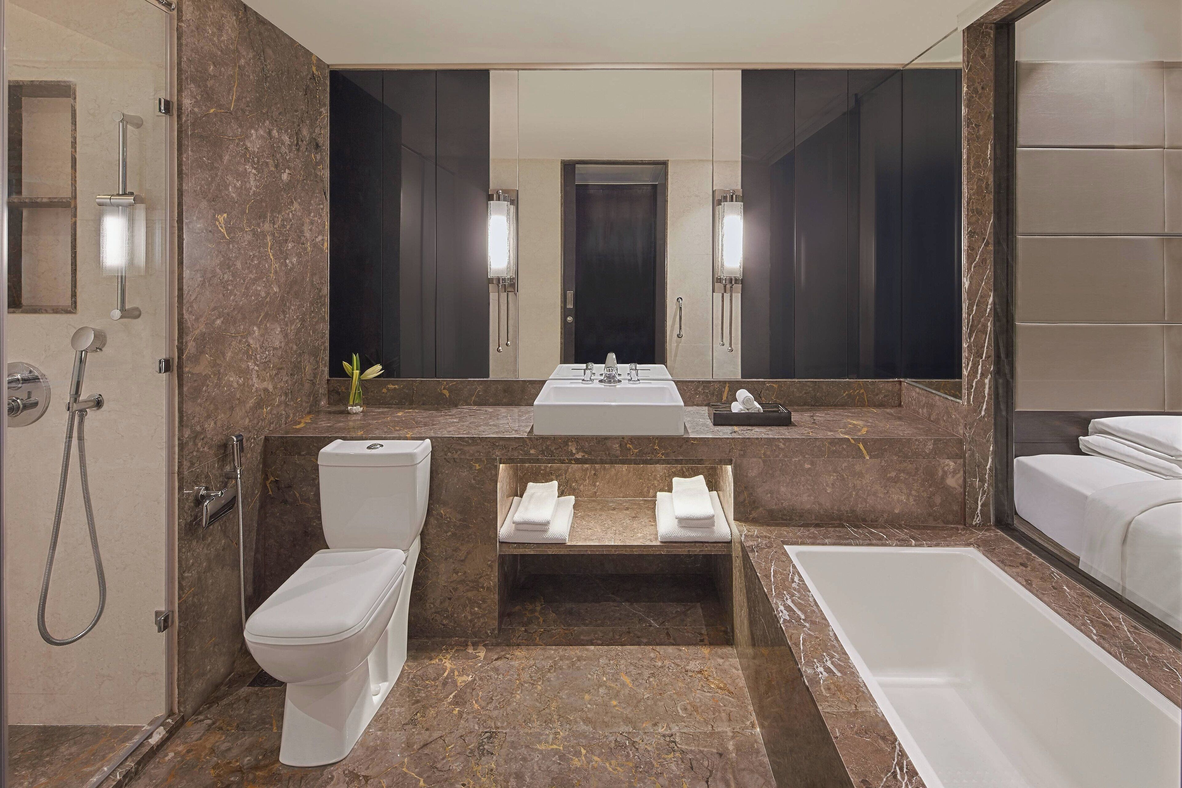 separate bathtub and shower, deep-soaking bathtub, rainfall showerhead