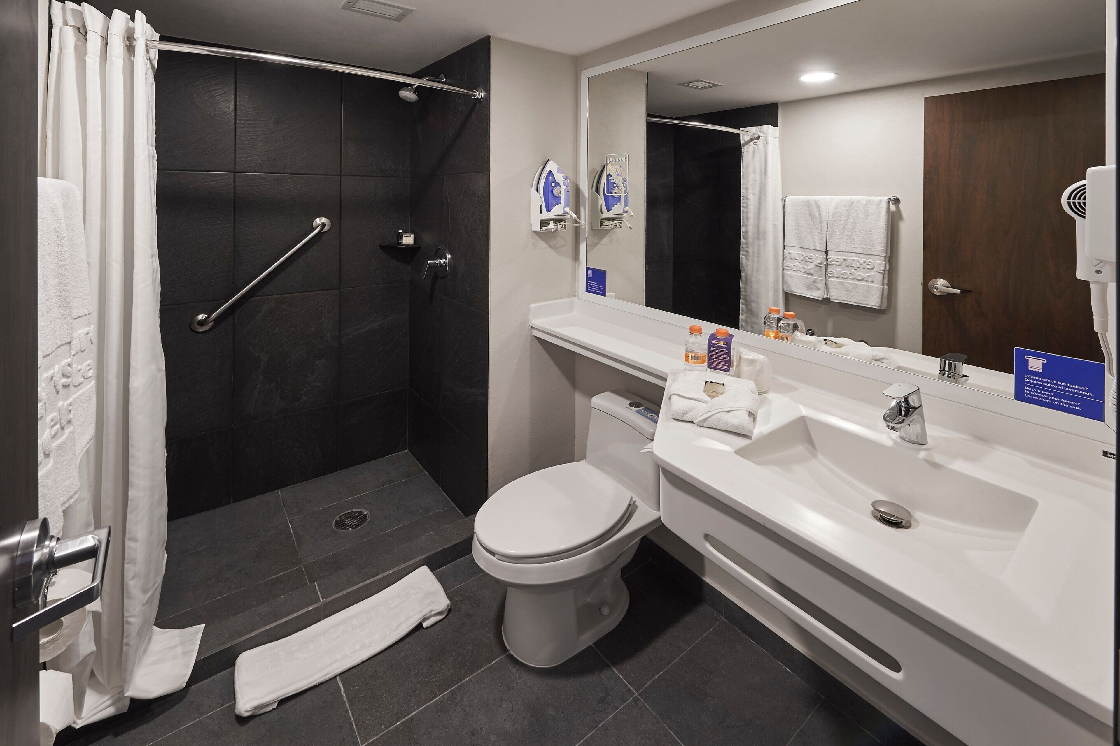 shower, free toiletries, hair dryer, towels