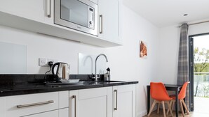 Suite, 1 Double Bed with Sofa bed, Kitchen | Living area