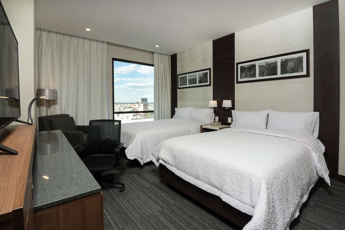 Ropa de cama de alta calidad y minibar