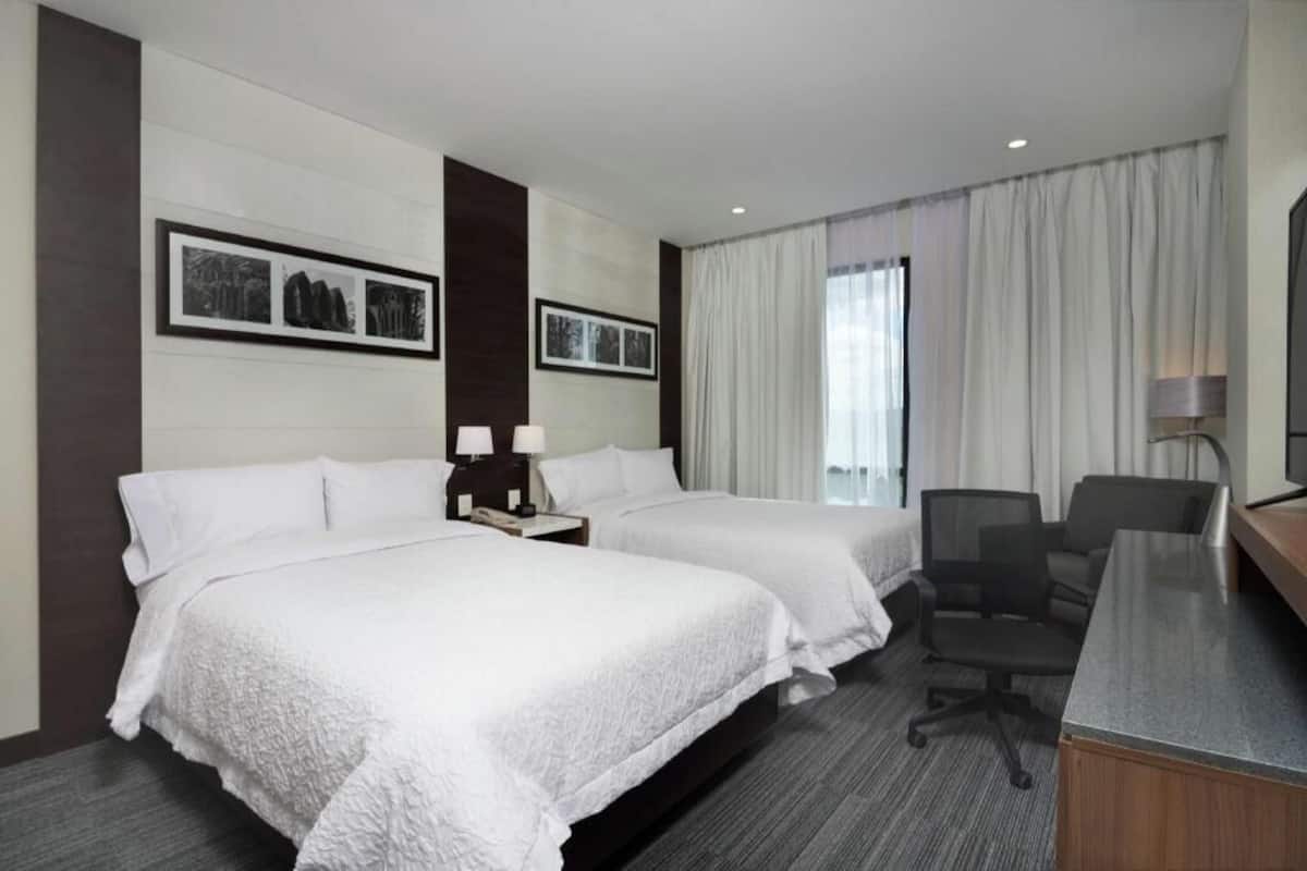 Ropa de cama de alta calidad y minibar