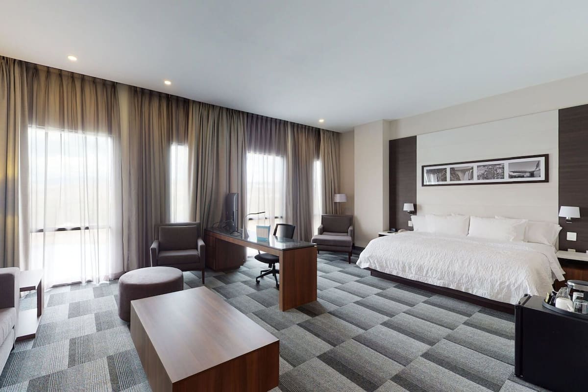 Ropa de cama de alta calidad y minibar
