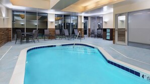 A swimming pool with lounge chairs and a changing room. - Fairfield Inn & Suites by Marriott Lexington East/I-75 (Lexington)