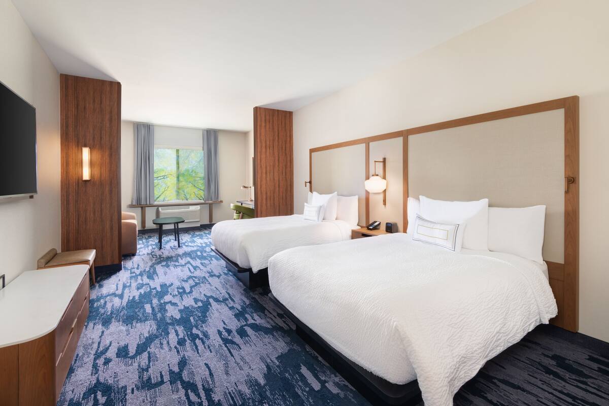 desk, laptop workspace, iron/ironing board, free cots/infant beds