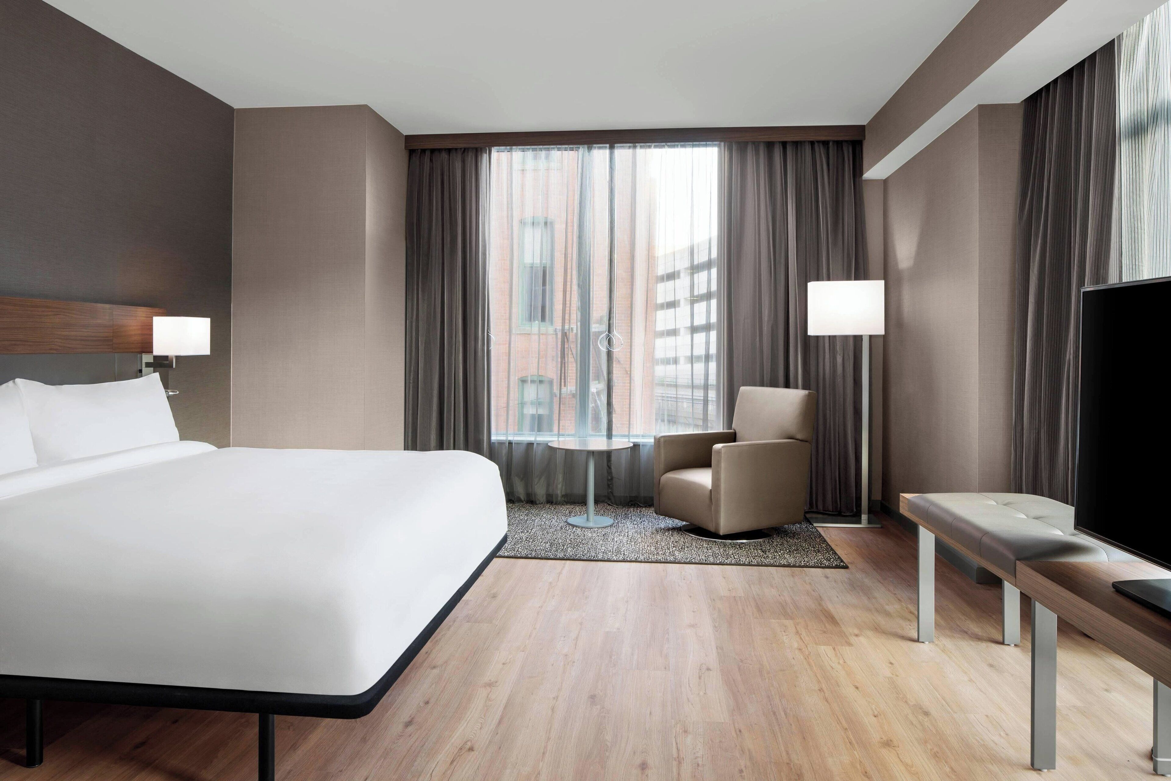 room, 1 king bed, corner | premium bedding, in-room safe, desk, laptop workspace