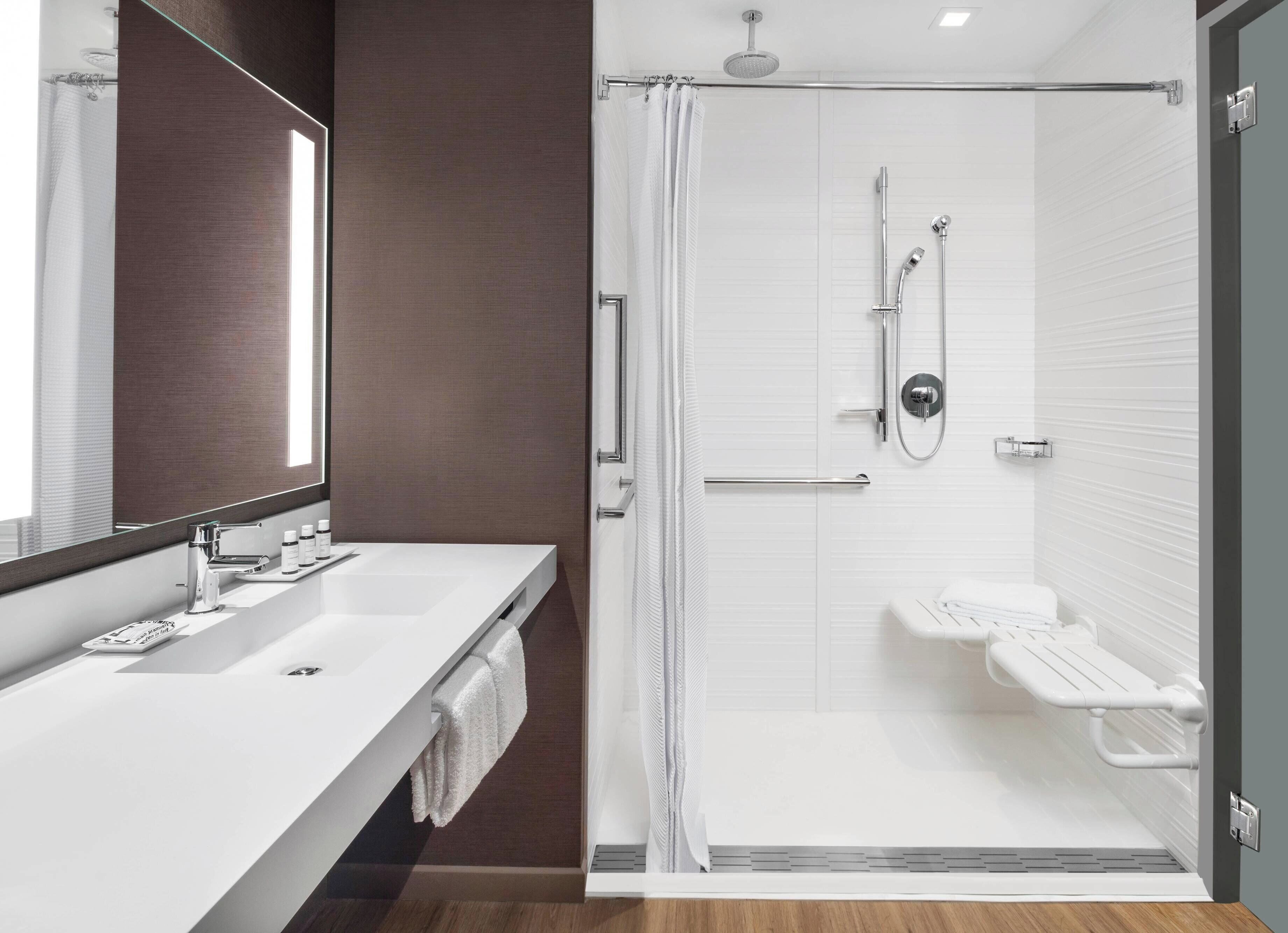 room, 1 king bed with sofa bed | bathroom | free toiletries, hair dryer, towels