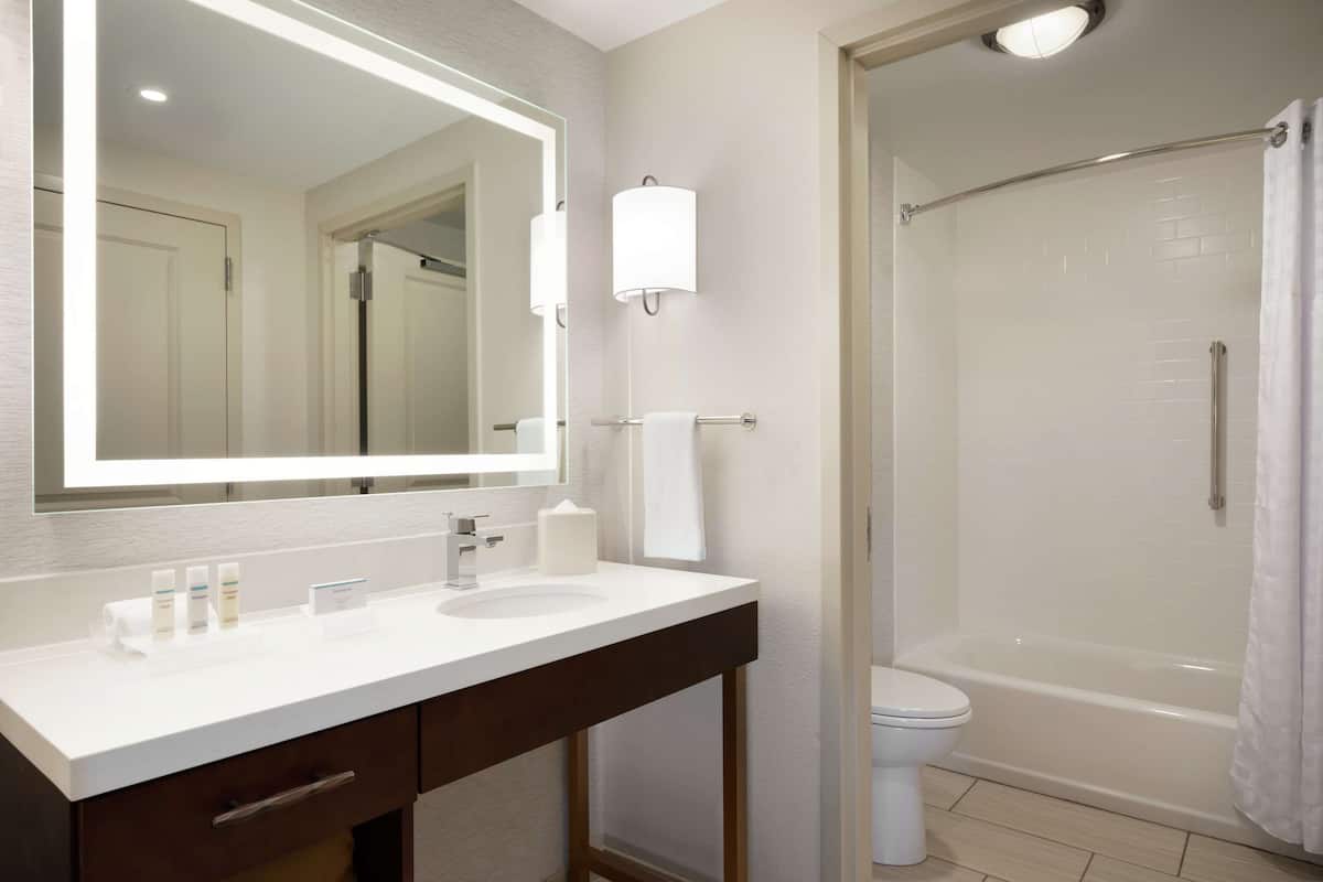 studio, 2 queen beds, non smoking | bathroom | combined shower/bathtub, eco-friendly toiletries, hair dryer, towels