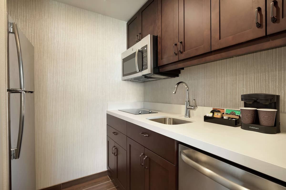 studio, 1 king bed, accessible (hearing) | private kitchen | full-sized fridge, microwave, stovetop, dishwasher