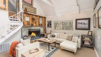 TV, fireplace, books, stereo