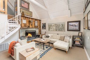 TV, fireplace, books, stereo