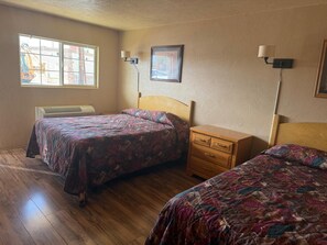 Room, Multiple Beds, Kitchenette (Unit) | Free WiFi, individually furnished, bed sheets - Economy Guest Village Rock Springs near I 80 (Rock Springs)