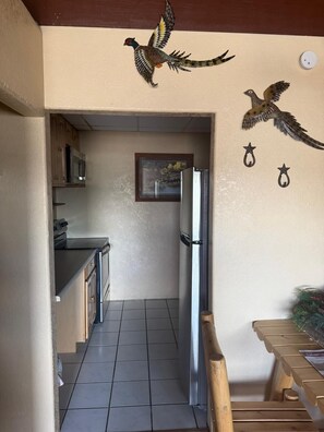 Room, 1 King Bed, Non Smoking, Kitchenette (Unit with Couch) | Private kitchenette | Coffee/tea maker, mini-fridge, microwave - Economy Guest Village Rock Springs near I 80 (Rock Springs)