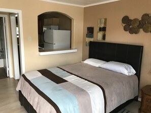 Junior Cottage, 1 Queen Bed, Non Smoking | Individually furnished, free WiFi, bed sheets - Economy Guest Village and Apartments (Rock Springs)