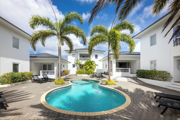 Outdoor pool, open 7:00 AM to 8:00 PM, pool umbrellas, sun loungers
